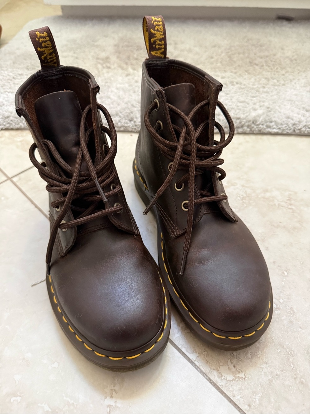 Dr. Martens women’s Dark Brown Leather Lace-Up Boots with Yellow Stitching